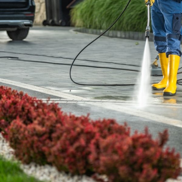 Homeowner,Power,Washing,Residential,Driveway,Using,Pressure,Washer.